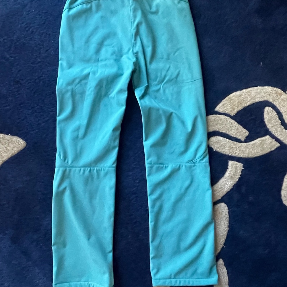 Tiffany blue ski pants. Never been worn.